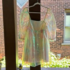 Storia Iridescent Babydoll Dress. New With Tags. Size Large. Has Glitter Flecks In The Fabric. It’s Magical! Color Comes Off Pink/Green/Yellow. Pink Floral Summer Dress, Holographic Dress, Dusty Pink Dresses, Baby Blue Dresses, Pink Green Yellow, Mauve Dress, Mini Skater Dress, Floral Sundress, Ruffle Mini Dress