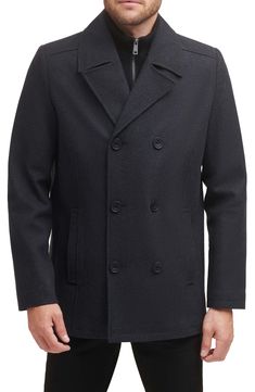 Add this classic wool peacoat to your wardrobe for an elevated style. Notched collar Long sleeves Button front Dual pockets 58% wool, 35% polyester, 4% acrylic, 3% other fibers Dry clean Imported Model stats: 6'1" height, 32" waist. Model is wearing size M. Classic Double-breasted Pea Coat For Fall, Classic Double-breasted Fall Pea Coat, Classic Fall Pea Coat With Double-breasted Button, Solid Wool Double-breasted Outerwear, Double-breasted Peacoat For Business In Fall, Wool Pea Coat For Business In Winter, Single Breasted Peacoat For Business In Fall, Solid Pea Coat For Formal Fall Occasions, Formal Double Button Pea Coat For Fall