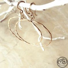 Laurel Hoop Earrings are a unique hoop design when you are wanting a pair of everyday earrings but want a little something special! Available in two sizes. The small hoops have two hammered circles and the large hoops have one circle. Both are highlighted with a diamond cut accent. Features: - Handcrafted from the finest .925 Sterling Silver & Gold fill Hoop design Small design approx. 1.5" long / largest circle size approx. 3/4" round Large design approx. 2.25" long / circle approx. 1 1/2" roun Small Hammered Hoop Earrings, Small Hammered Metal Hoop Earrings, Everyday Hammered Metal Hoop Earrings, Minimalist Hammered Metal Hoop Earrings, Everyday Small Hoop Hammered Earrings, Hand Forged 14k Gold Filled Hoop Earrings, Hammered Open Circle Hoop Earrings As A Gift, Hammered Open Circle Earrings For Everyday, Hammered Open Circle Hoop Earrings For Gift