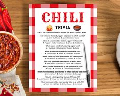 the chili trivia is next to a bowl of chili and a knife on a table