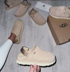 Give the gift of comfort and style this Valentine's Day with the viral UGG Clogs from Amazon! 🎁✨ These trendy clogs are not just a fashion statement but also the perfect blend of coziness and elegance. Step into spring with warmth and flair, making every stride a stylish one. Surprise your loved ones with a gift that speaks volumes of comfort and fashion. Embrace the season with UGG's signature charm! 💕 #UGGClogs #ValentinesDayGift #TrendyComfort #SpringStyle Ugh Clogs, Uggs Clogs, Uggs Clogs Outfit, Ugg Clog, Ugg Goldenstar Clog, Fall 2024 Shoes, Ugg Clogs Outfit