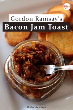 a jar filled with bacon jam next to crackers on a white plate and text overlay reads gordon ramsay's bacon jam toast