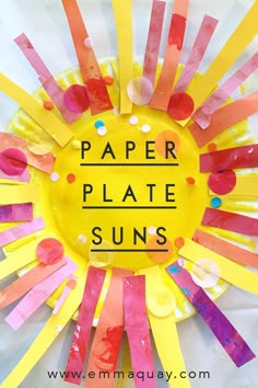 a paper plate sun made out of strips of construction paper and colored crepe paper