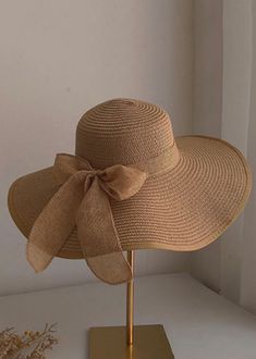 Stylish Khaki Bow Straw Woven Floppy Sun HatMade of fine Bow Straw Woven.Hat Circumference: 58cm/22.62". Matches easily with daily hairstyle, dresses & Shirts Long Linen Dresses, Floppy Sun Hat, Woven Hat, Baggy Dresses, Floppy Sun Hats, Daily Hairstyles, Linen Tshirts, Floral Dresses Long, Asymmetrical Design