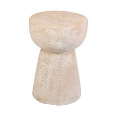 a small wooden stool sitting on top of a white floor