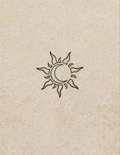 the sun and moon are drawn in black ink on a beige paper background, which is very similar to each other