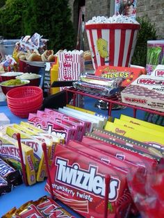 Concession Stand Hack for Candy. Backyard Movie Ideas - Movie Party in the great outdoors including easy recipes, seating hacks and party decor tips. #movies #outdoor #backyard #summer #movieparty #party #birthdayparty #movienight #partyideas #outdoormovie #outdoormoviescreen #underthestars #tipsandtricks #hacks #concession #concessionstand #candy #candybuffet Birthday Movie