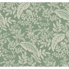 a green and white wallpaper with leaves and flowers on the bottom half of it