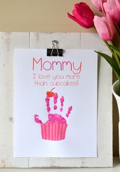 a card that says mommy i love you more than cupcakes with pink frosting