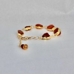 Rich in autumn spirit, these amber shades of carnelian organic stones come together in a warm bracelet.  Gold filled clasp and extender chain giving ultimate sizing options.  (7"-8") Comes with matching earrings. Autumn Spirit, Ithaca Ny, Bracelet Gold, Gemstone Bracelet, Matching Earrings, Jewelry Sets, Natural Gemstones, Gold Filled, Etsy Earrings