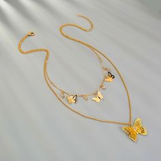 Specifications:   Alloy material One size Yellow Double Strand Jewelry As Gift, Yellow Double Strand Jewelry For Gift, Bohemian Gold Butterfly Jewelry, Adjustable Metal Necklace With Butterfly Charm, Gold Beaded Butterfly Necklace Gift, Gold Beaded Butterfly Necklace For Gift, Gold Beaded Butterfly Necklace Perfect As Gift, Yellow Clavicle Chain Necklace For Jewelry Making, Two Layer Necklace