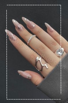 21 Trendy Almond Nails Style: 1. French 2. Ombre 3. Nude 4. Pastel 5. Metallics 6. Marble 7. Gradient 8. Matte 9. Floral 10. Neon diy and tips Aesthetic Silver Nails, Nails Asthetics Ideas, Silver Nails Aesthetic, Nails With Silver Design, Girly Coquette Aesthetic, Chrome Nails Silver, Silver Chrome Nails, Bow Nail Designs