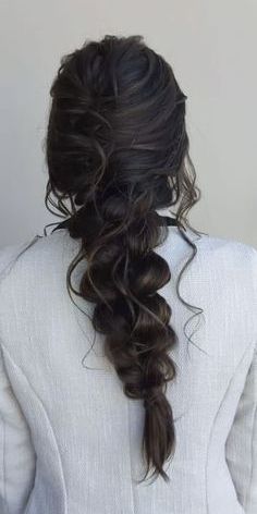 the back of a woman's head with long hair