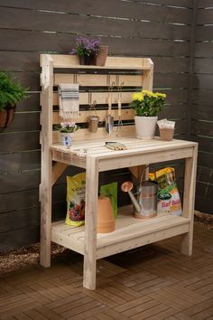 a potting bench made out of pallet wood