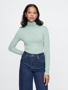 Soft stretch knit turtleneck.  Turtleneck.  Long sleeves.  Seam detail at back.  Fit: Stretch-to-Fit.  Slim & stretchy that forms to your shape.  Hits at the hip.  Models wearing Gap Sheer Turtleneck, Knit Turtleneck, Toddler Gifts, Aqua Blue, Work Outfit, Gap, Light Blue, Turtle Neck, Long Sleeves