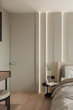 a bedroom with white walls and wooden floors