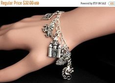 VALENTINE SALE Fantasy Bracelet.  Fairy Tale Charm Bracelet. Story Book Bracelet. Fable Bracelet. Fairy Story Bracelet. Silver Bracelet. Han by GatheringCharms from Gathering Charms by Gilliauna. Find it now at https://etsy.me/2l9GTCA! Whimsical Silver Bracelet Jewelry, Whimsical Silver Charm Bracelet, Fantasy Style Silver Bracelet, Adjustable Silver Fantasy Bracelet, Whimsical Nickel-free Silver Charm Bracelet, Silver Fantasy Bracelet, Handmade Themed Silver Charm Bracelet, Fantasy Bracelet, Book Bracelet