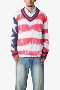 the Flag Loose Knitted Sweater is a custom knit sweater that is constructed from a synthetic blend yarn in a relaxed fit, multi color stripe details throughout, a very loose knit, and is finished with runs and distressing details throughout details relaxed fit 55% Acrylic 22% Nylon 15% Wool 8% Mohair model is 6’1, 140 lbs and wears a size medium 140 Lbs, Loose Knit, The Flag, Color Stripes, Knitted Sweater, Usa Flag, Red Sweaters, Red Blue, Knit Sweater