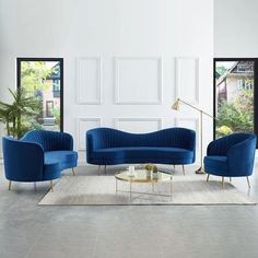 a living room with blue couches and chairs