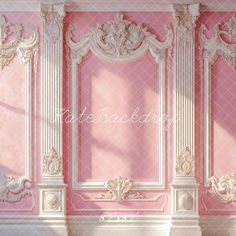 an ornate pink room with white trim