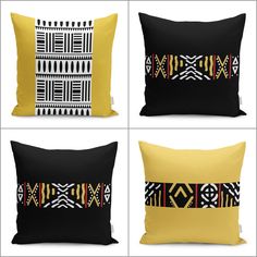 four black and yellow pillows with different patterns on them, each one has a decorative design