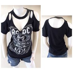 a women's black shirt with cutouts on the front and back, which has an open shoulder