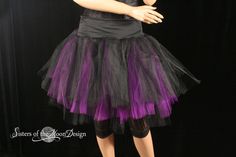 "Handmade from three layers around 35yards of soft smooth black bridal tulle. All layers of the Bridal tulle are tightly machine gathered and serged to the wide fabric stretch waistband. Skirt is made without an underskirt, it can bee seen through, since tulle is naturally sheer. 20\" longest length This skirt is not made yet, It is made when ordered! Measurement: Sizes go by smallest waist size tutu will fit to largest Hips tutu fits over XSmall 24\"-34\"inches Small 26\"-38\"inches Medium 30\" Halloween Party Tulle Petticoat, Fitted Tulle Skirt For Halloween, Halloween Fitted Tulle Skirt, Halloween Dance Tulle Skirt, Purple Skirt For Halloween Costume Party, Gothic Petticoat For Halloween Party, Gothic Halloween Party Petticoat, Halloween Stretch Tulle Petticoat, Stretch Tulle Petticoat For Halloween