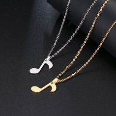 This gorgeous Quaver-shaped pendant necklace is a perfect gift for a musician, a piano player, an instrumentalist or a music lover! Material：Alloy Color: Gold / Sliver-plated Size: Chain length 45cm; Quaver-shaped Pendant is about 2cm long Silver Music-themed Metal Necklace, Music-themed Silver Pendant Necklace, Silver Music-themed Jewelry For Party, Music-themed Silver Jewelry For Parties, Music Symbols, Piano Player, Music Jewelry, Music Note, Music Lover