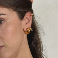 Designed in-house as the Joiana Perfect Chunky Hoops, your daily earwear. The earrings made for the daily hoop lovers, who want a small chunky hoop for daily wear. Material Stainless Steel 18 k gold plated (Gold Hoops) Joiana Ball Back Gold Plated Ear Cuff For Everyday Wear, Everyday Gold Plated Ear Cuff, Everyday Gold Ear Cuff With Ear Wire, Trendy Gold Ear Cuff For Everyday Wear, Gold Tarnish-resistant Small Hoop Ear Cuff, Gold Small Hoop Hypoallergenic Ear Cuff, Gold Hypoallergenic Small Hoop Ear Cuff, Hypoallergenic Gold Small Hoop Ear Cuff, Candy Gift Ideas