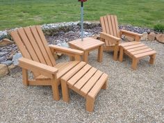 three wooden chairs and one chair are in the gravel near a fire hydrant with a parking meter