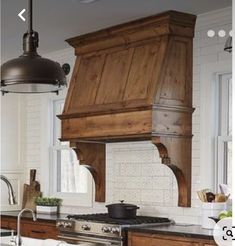 a kitchen with wooden cabinets and an oven