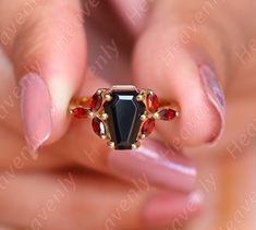 KINDLY LEAVE YOUR CONTACT NUMBER AT THE TIME OF PLACING ORDER FOR SHIPPING PURPOSE. RING DETAILS: AAA NATURAL ONYX GEMSTONE 925 14KT ROSE GOLD PLATED STERLING SILVER RING GEMSTONE SHAPE- COFFIN GEMSTONE TYPE - ONYX GEMSTONE GEMSTONE SIZE-  10.00 MM X 7.00 MM ACCENTS- NATURAL MARQUISE RED GARNET GEMSTONE SETTING - PRONGE TYPE RING TYPE - IT'S AN ONYX GEMSTONE 925 ROSE PLATED STERLING SILVER ENGAGEMENT RING PLATING TYPE- 14KT YELLOW GOLD PLATING OCCASIONS : WEDDING RING, ENGAGEMENT RING,  RING, FL Yellow Gold Engagement, Sterling Silver Engagement Rings, Yellow Gold Engagement Rings, Onyx Ring, Garnet Gemstone, Types Of Rings, Red Garnet, Rings For Her, Gold Engagement Rings