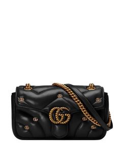 Gucci presents this shoulder bag made of matelassé leather with chevron pattern and applied Double G studs.- GG Marmont small shoulder bag- Color: black- Gold-tone hardware- Double G- Microfiber lining- Inside pocket with zipper- Flap with spring closure- Small size: W 26 cm x H 15 cm x D 7 cm- Made in ItalyGender: WomenMaterial: LEATHERColor: BlackMade in: ImportedProduct ID: 443497 AACPG_1000 BLACK*Import tax/duty will be calculated at checkout (If applicable) Gg Marmont Small Shoulder Bag, Gg Marmont Bag, Gucci Marmont, Gucci Gg Marmont, Gucci Shoulder Bag, Gg Marmont, Shoulder Bag Black, Gucci Mules, Crossbody Tote