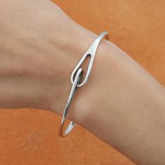 A Classic Tiffany & Co. Design- The Infinity Loop Bangle Here Set In Sterling Silver. The Bangle Is Endless, With Two Loops Interlocked To Create An Infinite Bond, Flexible Yet Forever Entwined Like The Greatest Loves In Our Lives. The Bangle Measures About 7 1/4 Inches Around And Is 1/8 Inch At Its Thinnest Points And 3/8 Inch At Its Widest. This Piece Was Just Polished At The Flagship Store. Bracelet Will Come With Pouch And Tiffany Blue Box. Tiffany Blue Box, Vintage Tiffany, Tiffany Co Jewelry, The Infinity, Blue Box, Flagship Store, Tiffany Blue, Great Love, Tiffany & Co.