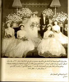 an old black and white photo of a wedding party