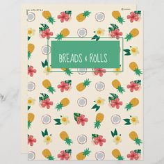 this is an image of a notebook with pineapples and flowers on the cover