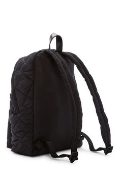 Quilted construction adds a luxe feel to this nylon backpack. Single top handle. Adjustable shoulder straps. Two-way zip top closure. Exterior features 1 zip pocket. Interior features 1 zip pocket. Perfect for school backpack or bookbag. Approx. 14" H x 14" W x 7" D. Approx. 3" handle drop, 6-12" strap drop. Imported Marc Jacobs Bag, School Backpack, Travel Collection, Designer Backpacks, Personal Shopping, School Backpacks, Zip Top, Sling Backpack, Womens Backpack