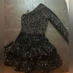 One Sleeve Design Top Is Fully Lined Zipper Enclosed Stretch 3-4 Inches Sequin Babydoll Dress, Babydoll Dress, Black Sequins, Sleeve Designs, Dress First, A Black, Baby Dolls, One Shoulder, Sequin