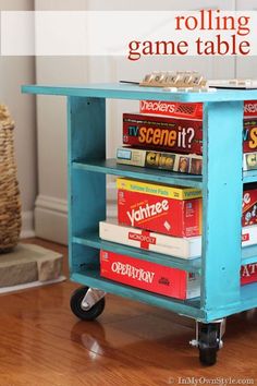 a rolling game table with magazines on it and the words, rolling game table?