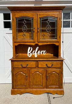 an old china cabinet with the words before painted on it