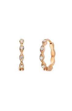 A total of eight diamonds extend their shine onto these minimalist huggie hoop earrings that can be worn from everyday to special occasions. 3/8" hoop diameter Total diamond weight: 0.06ct. Color: G-H Clarity: SI1-VS2 18k gold/diamond Imported >Diamond Guide Asian Owned/Founded Rose Gold Cubic Zirconia Small Hoop Huggie Earrings, Anniversary Small Hoop Rose Gold Huggie Earrings, Anniversary Rose Gold Small Hoop Huggie Earrings, Small Hoop Huggie Earrings With Single Cut Diamonds, Elegant Stackable Small Hoop Earrings, Elegant Small Hoop Stackable Earrings, Rose Gold Prong Setting Huggie Earrings, Rose Gold Small Hoop Huggie Earrings With Diamond Accents, Elegant Stackable Hoop Earrings