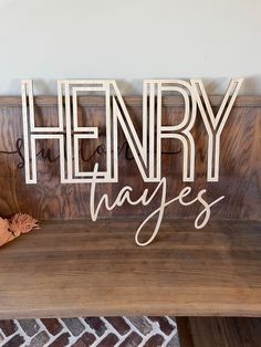 a wooden sign that reads henry says on it