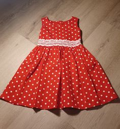 🎀 Welcome to our charming collection! 🎀 Introducing our adorable Toddler Red Polka Dot Dress, the perfect addition to your little one's wardrobe! Handcrafted with love and attention to detail, this delightful dress is sure to capture hearts wherever your little princess goes. 🌟 Features: 🔴 Vibrant Red Hue: Radiate joy and playfulness with the eye-catching red color of this dress. ⚪ Classic Polka Dot Pattern: Timeless and charming, the white polka dots add a touch of whimsy and style. 👗 Comf Cute Red A-line Dress, Cute Polka Dot Dress-up Dresses, Cute Polka Dot Dress For Dress-up, Polka Dot Summer Dress For Formal Occasions, Playful Polka Dot Dress For Dress-up, Playful Polka Dot Dress For Dress-up Occasions, Playful Polka Dot Dress, Playful Fitted Red Dress, Playful Polka Dot Fitted Dress