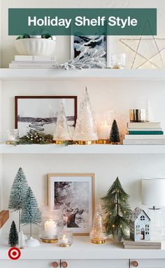 the shelves are decorated with christmas trees, candles and other holiday decorating items on them