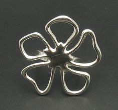 Sterling silver ring 925/1000, flower. Stamped 925. Approximate weight 5.7 grams. Dimensions 3.6x3.6 cm (1.44x1.44 inches). All our jewels are made from solid sterling silver 925/1000 and are carefully crafted by hand in our family workshop. We dispatch your orders in 5 working days, worldwide and the postage is $5. We ship registered priority mail. Please allow 5-7 working days for delivery in Europe and 10-15 working days outside Europe. For any questions - please do not hesitate to contact me Handmade Silver Flower Ring For Formal Occasions, Silver Handmade Flower Ring For Formal Occasions, Silver Flower Ring Stamped 925, Hallmarked Silver Flower Ring, Sterling Silver Flower Ring For Formal Occasions, Formal Sterling Silver Flower Ring, Formal Flower Ring Stamped 925, Silver Flower-shaped Ring For Formal Occasions, Formal Flower Shaped 925 Silver Ring