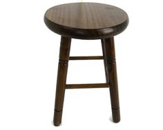 a small wooden stool on a white background