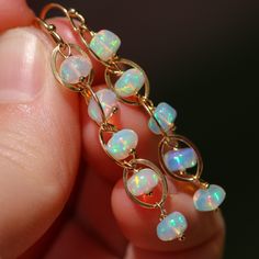 Ethiopian Opal Earrings Welo Opal Earrings Fire Opal Earrings Genuine Opal Dangle Earrings 14K Opal Gold Chain Earrings Small Opal Earrings (24172 - 3) Gold Opal Hoop Jewelry, Gold Hoop Opal Jewelry, Fusion Style Wire Wrapped Drop Earrings, Handmade Opal Drop Earrings, Fusion Wire Wrapped Dangle Jewelry, Elegant Gold Opal Hoop Earrings, 14k Gold Filled Dangle Jewelry For Parties, Gold Hypoallergenic Opal Jewelry, Hypoallergenic Gold Opal Jewelry