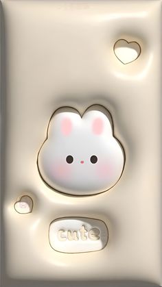 a cute little white cat on the side of a light switch plate with hearts in the background