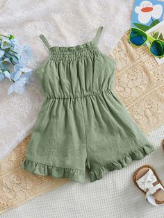 Spring Vacation Bubble Romper With Ruffles, Cute Bubble Romper With Ruffles For Vacation, Cute Ruffled Bubble Romper For Vacation, Green Bubble Romper With Ruffles For Playtime, Green Ruffled Bubble Romper For Playtime, Cute Green Bubble Romper With Ruffles, Solid Sleeveless Bubble Romper For Beach, Sleeveless Solid Color Bubble Romper For Beach, Cotton Bubble Romper With Ruffles For Vacation