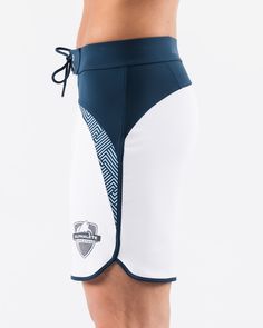 Athleisure Athletic Shorts For Water Sports With Built-in Shorts, Athleisure Athletic Shorts With Built-in Shorts For Water Sports, Sporty Navy Swimwear With Built-in Shorts, White Short Swimwear For Surfing, White Training Bottoms With Elastic Side Panels, Sporty Fitted Shorts With Tie-side Bottom, White Sporty Swim Trunks For Water Sports, White Short Swim Trunks For Water Sports, White Surfing Shorts